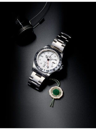 Imagem de relógio Rolex com certificado.