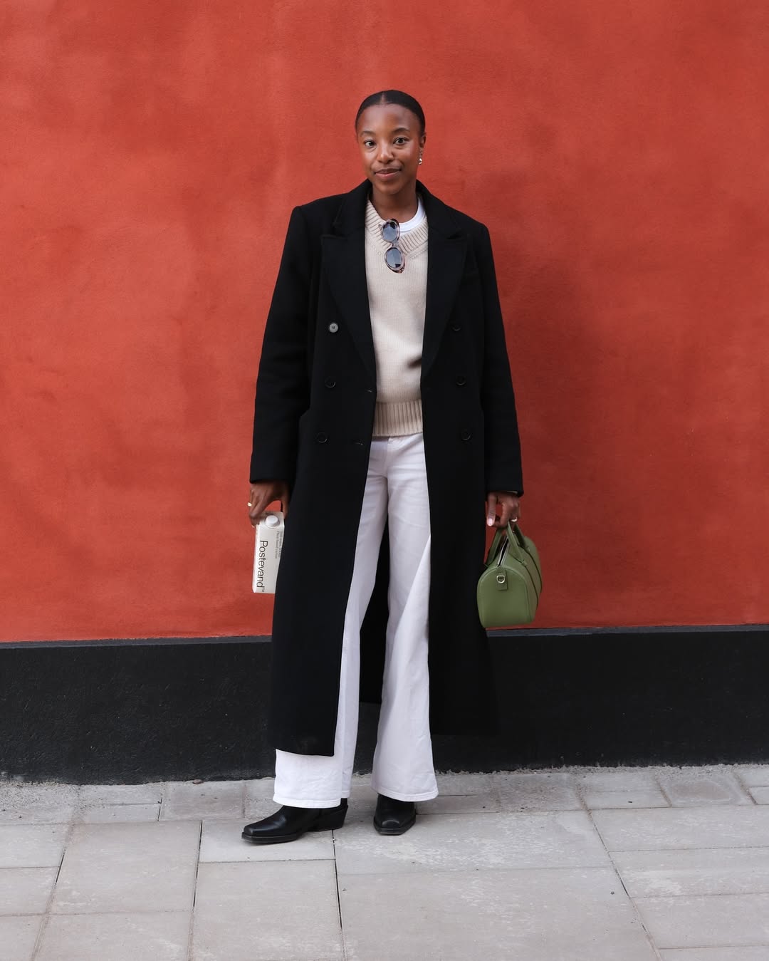 looks com sobretudo preto