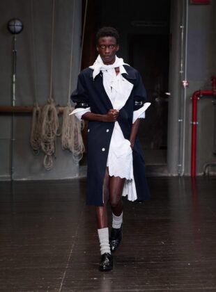 Simone Rocha SS27 Menswear Look 12 SALIOU An abbreviated car coat in cotton twill with pearlise